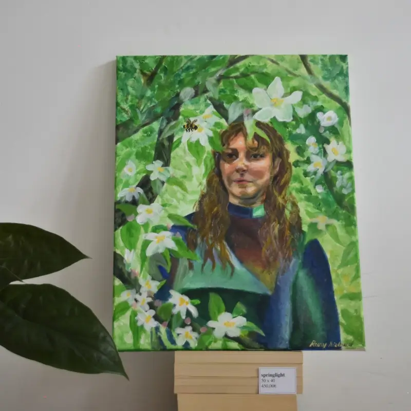 Portrait of woman surrounded by foliage
